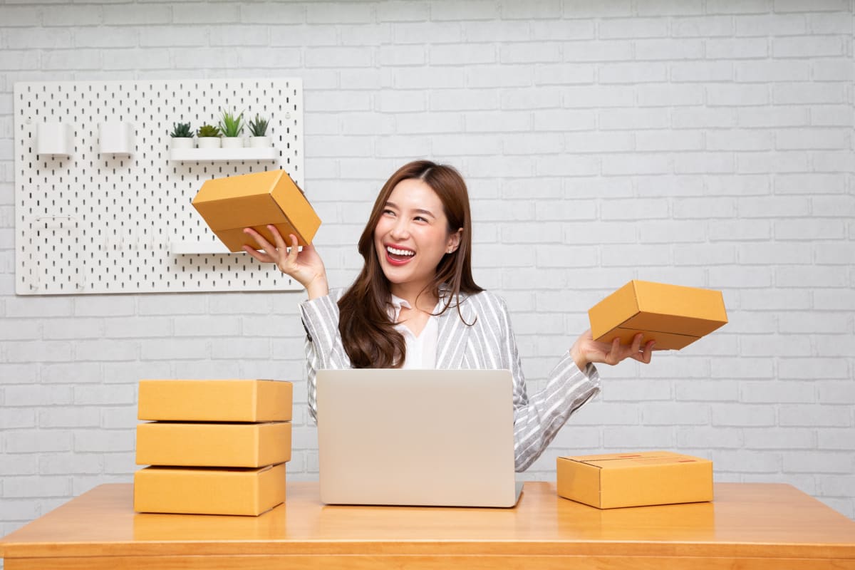 woman holding boxes