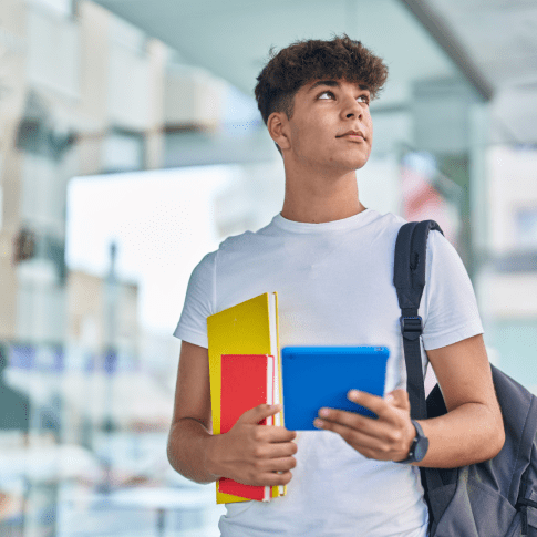 #Abovethegrade campaign_Young man with books studying