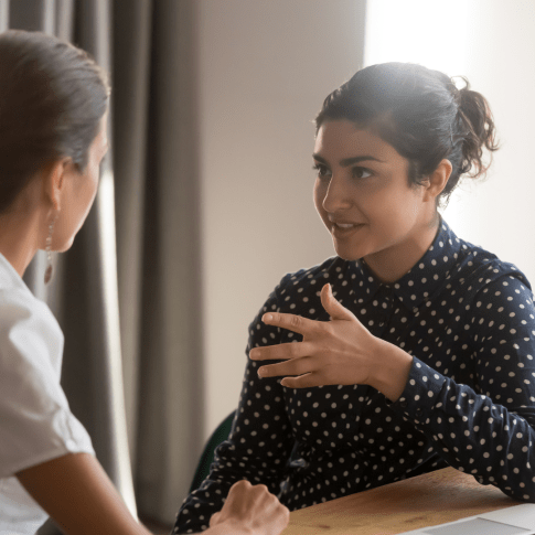 #AbovetheGrade campaign - young woman in a meeting